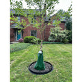 EcoBorder Tree Ring around a young tree in front of a brick house