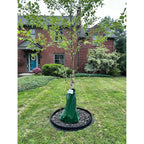 EcoBorder Tree Ring around a young tree in front of a brick house